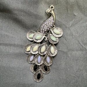 Silver Tone Peacock Pendant Featuring Rhinestones and Multicolor Feathers